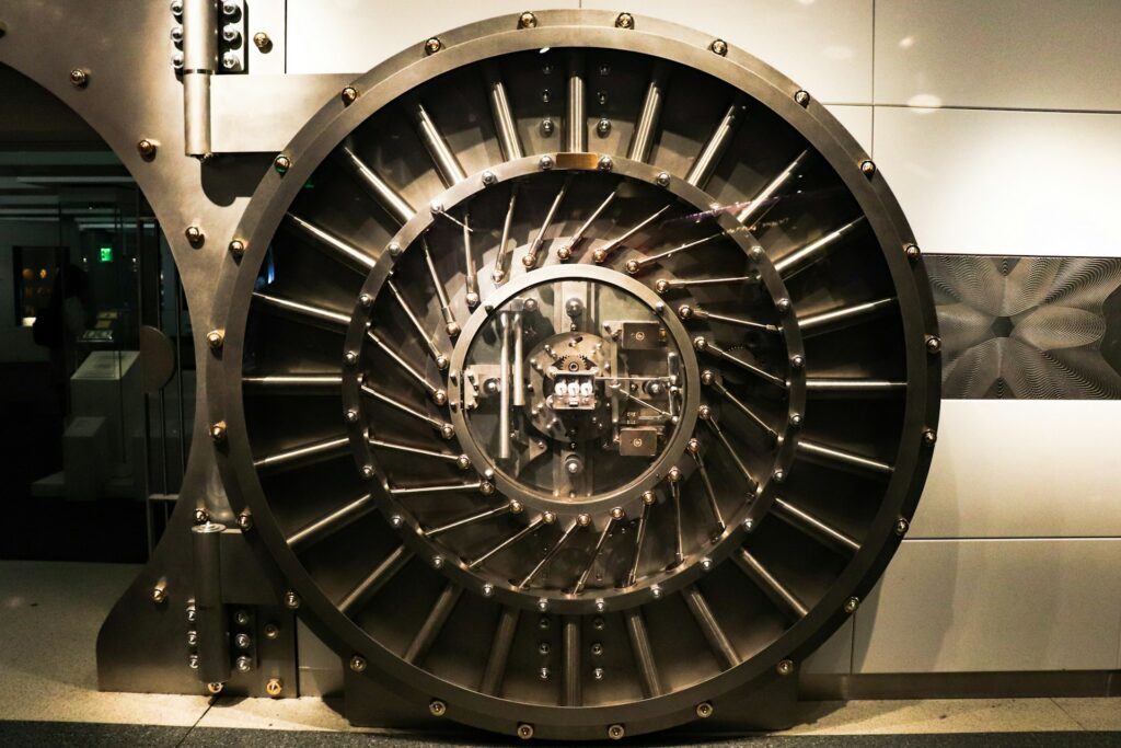Large circular steel vault door symbolizing protected CTV inventory ownership, publisher control, and secure long-term monetization infrastructure in connected TV advertising.